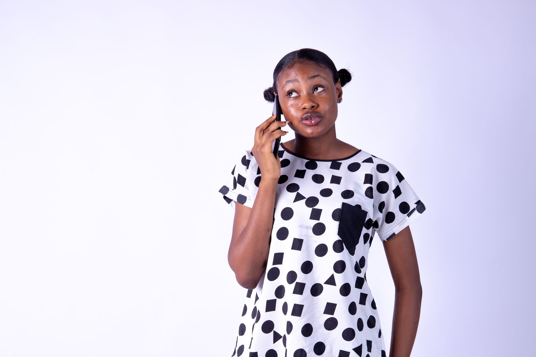 Nigerian woman making a phone call